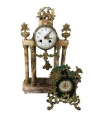 A 19th century French gilt metal and sienna marble portico eight day mantel clock,