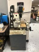 An Axminster AW19 FM morticer on an enamelled metal cabinet with some contents