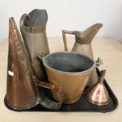 A group of Victorian copper jugs, funnel,