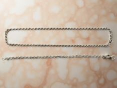 A sterling silver rope twist necklace, length 41 cm, together with similar bracelet length 18.