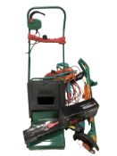 A Black & Decker strimmer, a Bosch strimmer, an electric lawn mower and a Sovereign hedge trimmer.