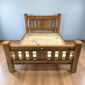 A modern pine 5ft bed frame, overall dimensions 230 cm L x 166 cm W.