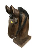 A carved hardwood horse bust, height 57 cm.