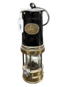 A 19th century Patterson Lamps Gateshead on Tyne brass and steel miner's safety lamp.