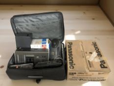 A suitcase containing vintage radios including Hitachi, cassette player, other electricals,