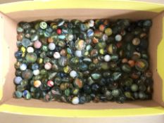 A box of vintage glass marbles