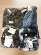 A pair of BDG lady's denim jeans, 27W 32L, together with a further pair of tie-die pattern bottoms,