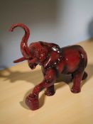 A Peggy Davies pottery flambé elephant, height 23 cm.