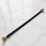A Victorian high-carat gold-mounted handle from a whip or riding crop,