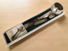 A silver napkin ring, silver-handled knife, thimble, caddy spoons,