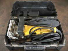 A Dewalt DW 682 sander in box