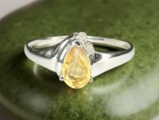 A white gold citrine and diamond ring, stamped 10k, size N CONDITION REPORT: 1.