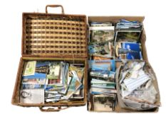 A wicker hamper and a further box containing a large quantity of colour postcards, loose stamps,