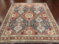 A 20th century machined carpet of Persian design, 310 cm x 272 cm.