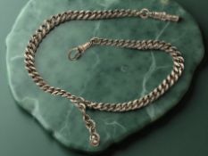 A silver watch Albert chain, length 36cm. CONDITION REPORT: 32.