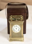 A brass-cased striking and repeating carriage clock, retailed by Reid & Sons, Paris,