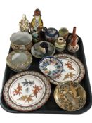 A collection of Japanese export dishes and bowls, figures,
