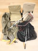 A collection of fishing equipment : landing nets, waders,