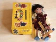 A Pelham puppet 'Girl', in box.