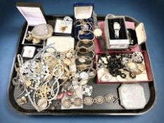 A group of costume jewellery including various wristwatches, a House of Faberge enamel pendant,