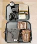 A bag containing binoculars, pair of military 1908 binoculars,