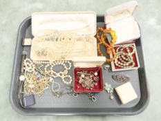 A group of costume jewellery including various silver items, simulated pearls,