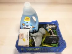 A Mac Allister electric drill, a mini speaker, figure of a dog and a bottle of detergent.
