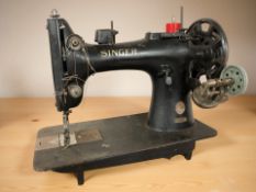 A 19th century Singer cast iron sewing machine numbered 132K7.