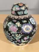 A Chinese famille noir ginger jar, height 32 cm.