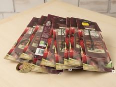 A gent's large gold plated ring in the form of a pyramid and nine Yankee Candle car air fresheners.