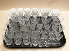 A collection of crystal drinking glasses including Stuart examples