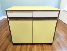 An Eastham melamine topped refrigerator cabinet, 105 cm x 53 cm x 91 cm.