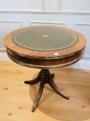 A reproduction mahogany drum occasional table, diameter 61 cm.