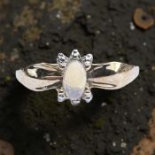 A gold opal ring, stamped 10kt, size N CONDITION REPORT: 1.