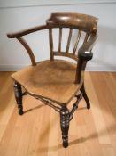 An early 20th century mahogany elbow chair, width 67 cm.