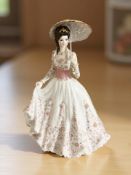 A Royal Worcester figure 'The Garden Party' No. 423 of 7500.