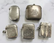 Five antique silver vesta cases.
