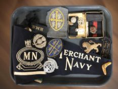 A group of naval and other embroidered insignia