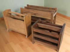 Three retro teak magazine racks, widest 50 cm.