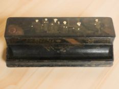 A 19th century chinoiserie lacquered desk stand, width 23 cm.