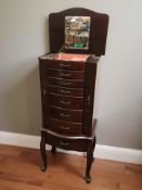 A reproduction jewellery storage chest on cabriole legs, 42 cm x 31 cm x 101 cm.