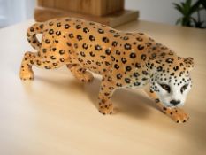 A Beswick leopard, length 30 cm.