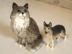 A Beswick cat, No. 1867, height 20.5 cm, and a further Beswick alsatian CH Ulrica of Brittas.