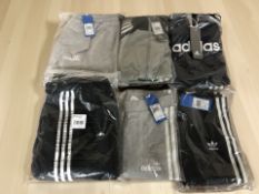An Adidas children's navy blue hoodie, size 6-7 years,