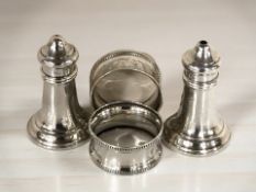 A pair of silver napkin rings, Chester 1923,