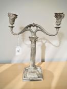 A continental silver twin-branch candelabrum, stamped 835,