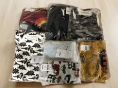 A group of Next children's clothing, various sizes.