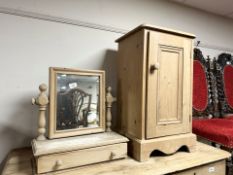 An early 20th century pine pot cupboard, width 39 cm, together with a dressing table mirror.