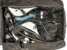 A set of scuba diving equipment in carry bag.
