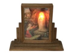 A religious illuminated picture in oak frame, height 33 cm.